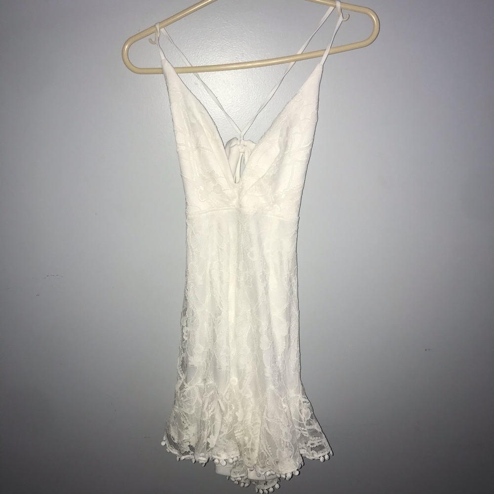Xenia’s White Lace Dress
